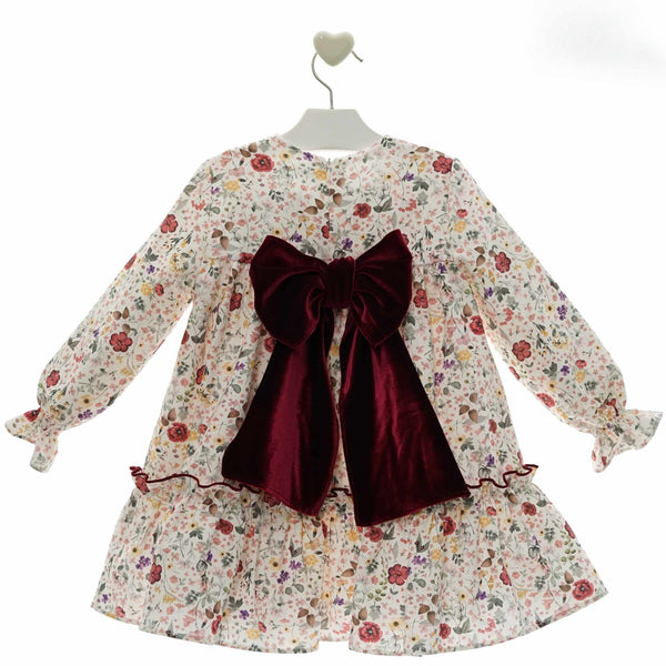 VESTIDO DE NIÑA CON LAZO DE TERCIOPELO EN LA ESPALDA Y FLORAL GRETA