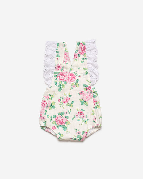 GIRLS FLORAL PRINT OVERALL WITH EYELET EMBROIDERY RUFFLES ON SIDES